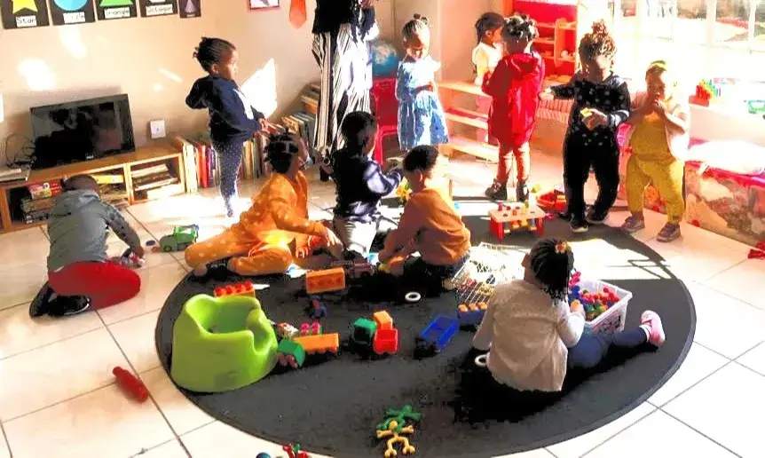Children at play in a Waterfall Kids Academy classroom
